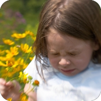 image of young girl about to sneeze